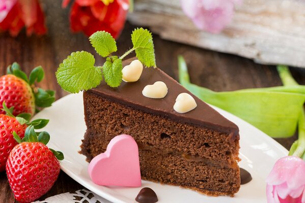 A piece of chocolate sponge cake with love