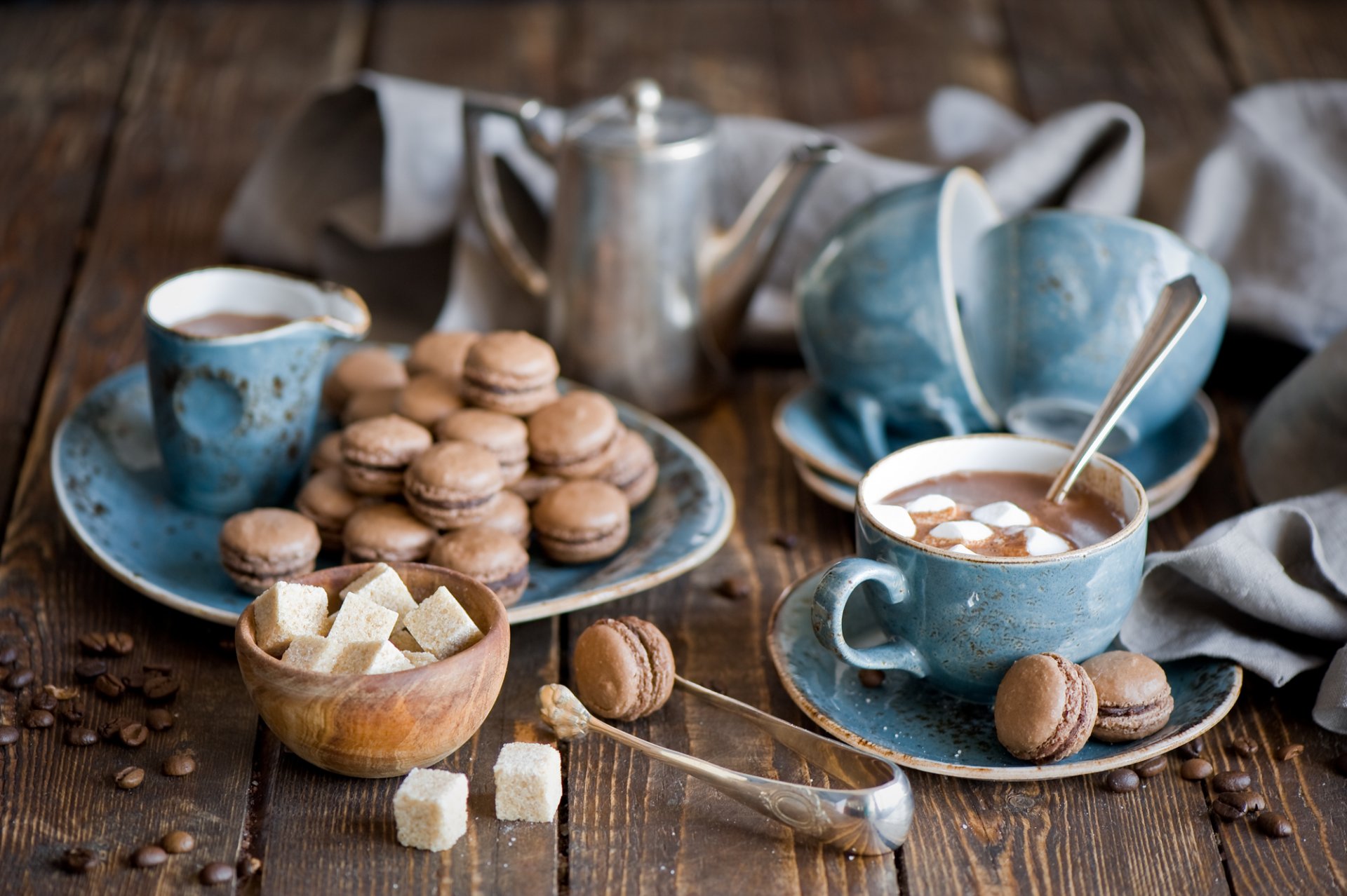 hot chocolate pasta kettle mugs coffee beans marshmallow still life