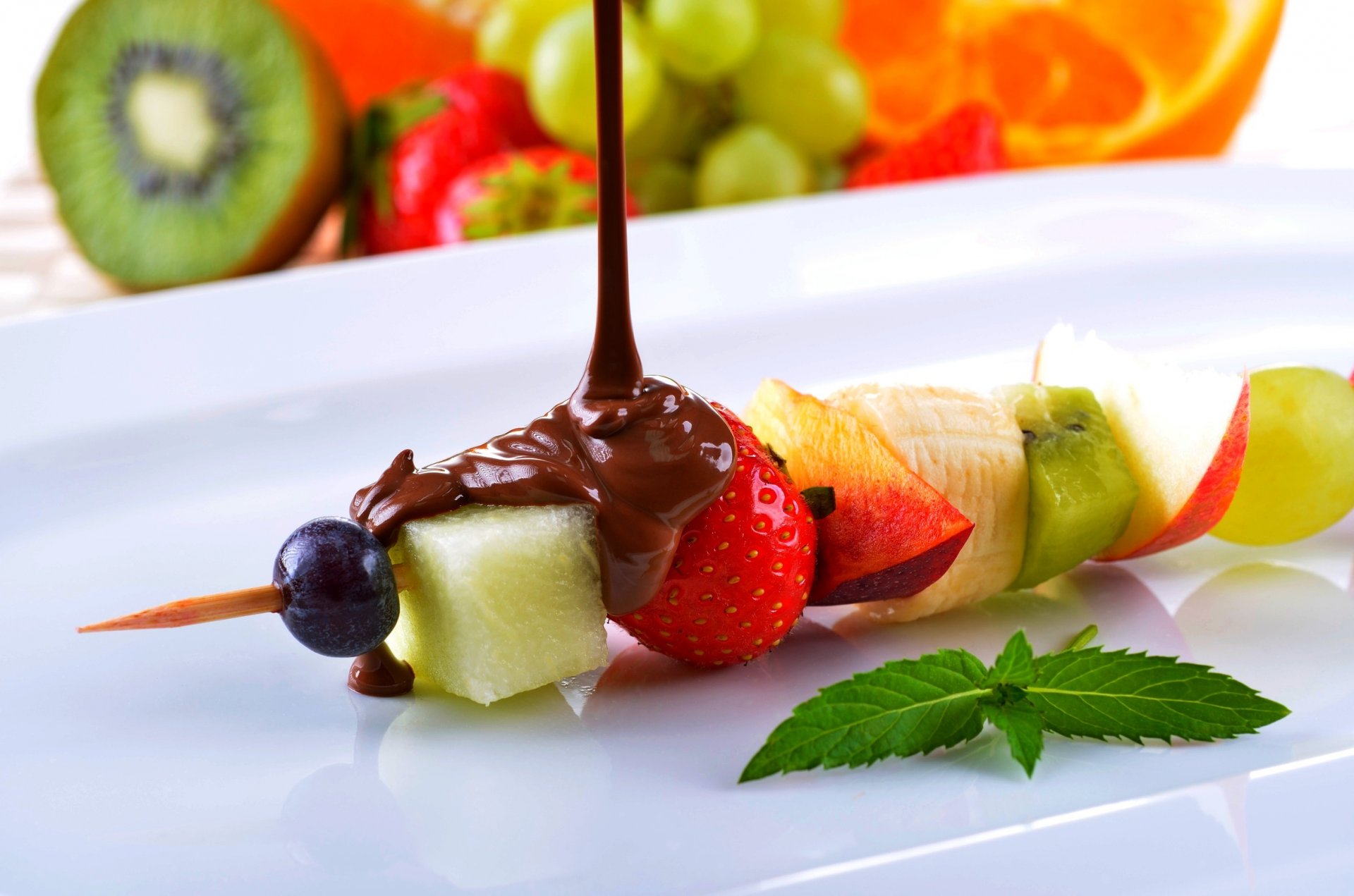 fruits fruit skewers chocolate kiwi strawberry grape orange banana fruit kebab grapes food