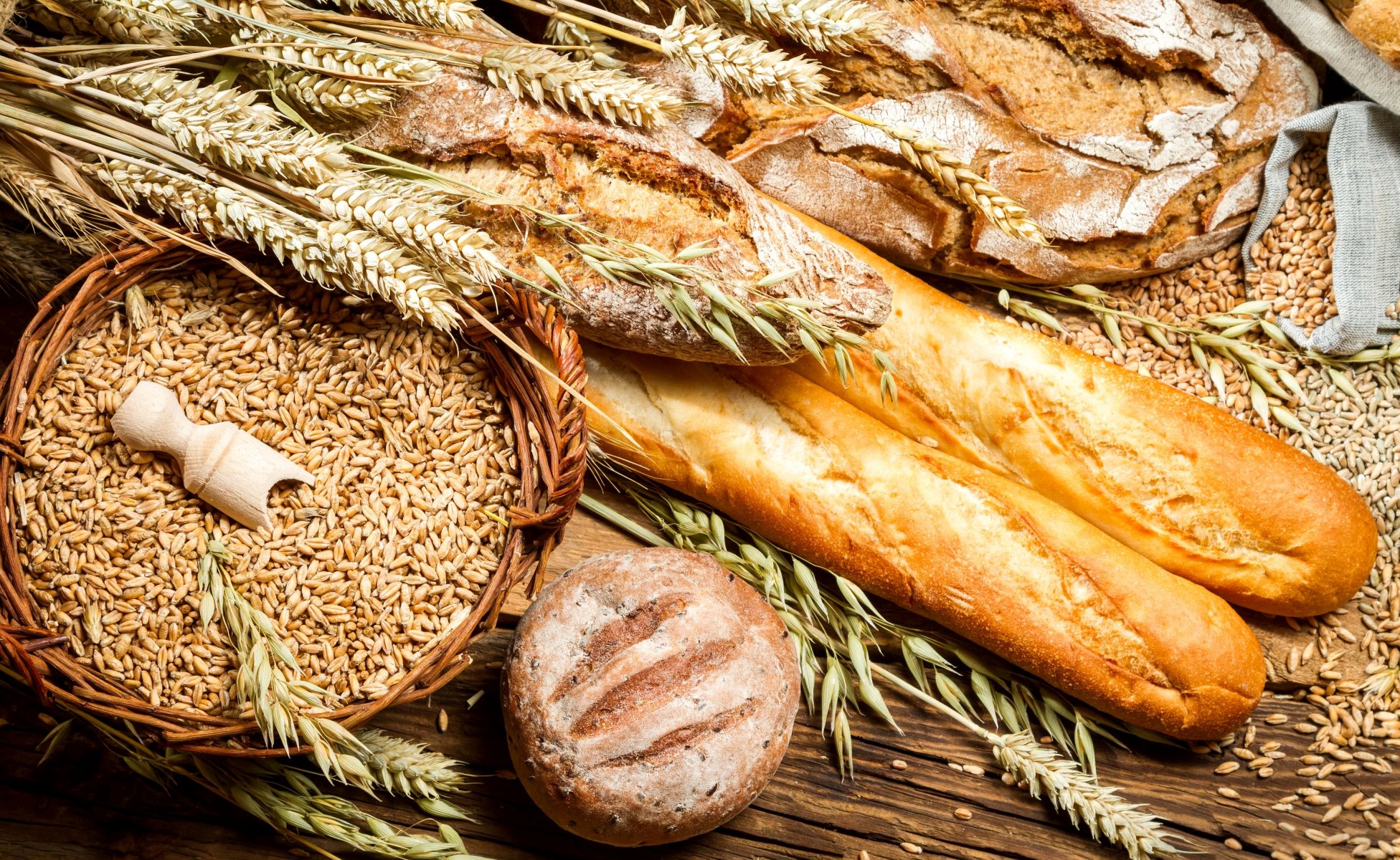 bread rye round loaves baking shopping bags corn wheat spikes ears table