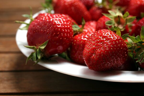 Red strawberries on a plate