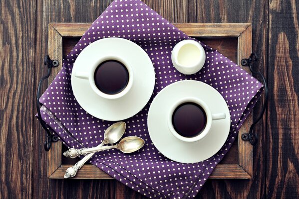 Coffee in cups on saucers