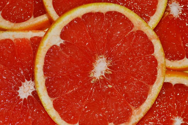 Bright red grapefruit slices