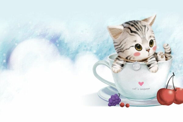 A kitten in a mug with the inscription