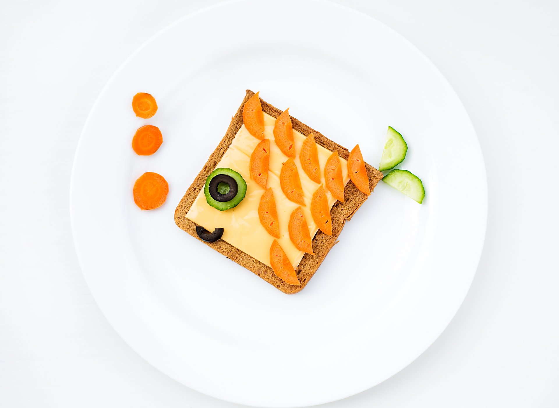 dish food breakfast creative bread carrots cucumber cheese olive