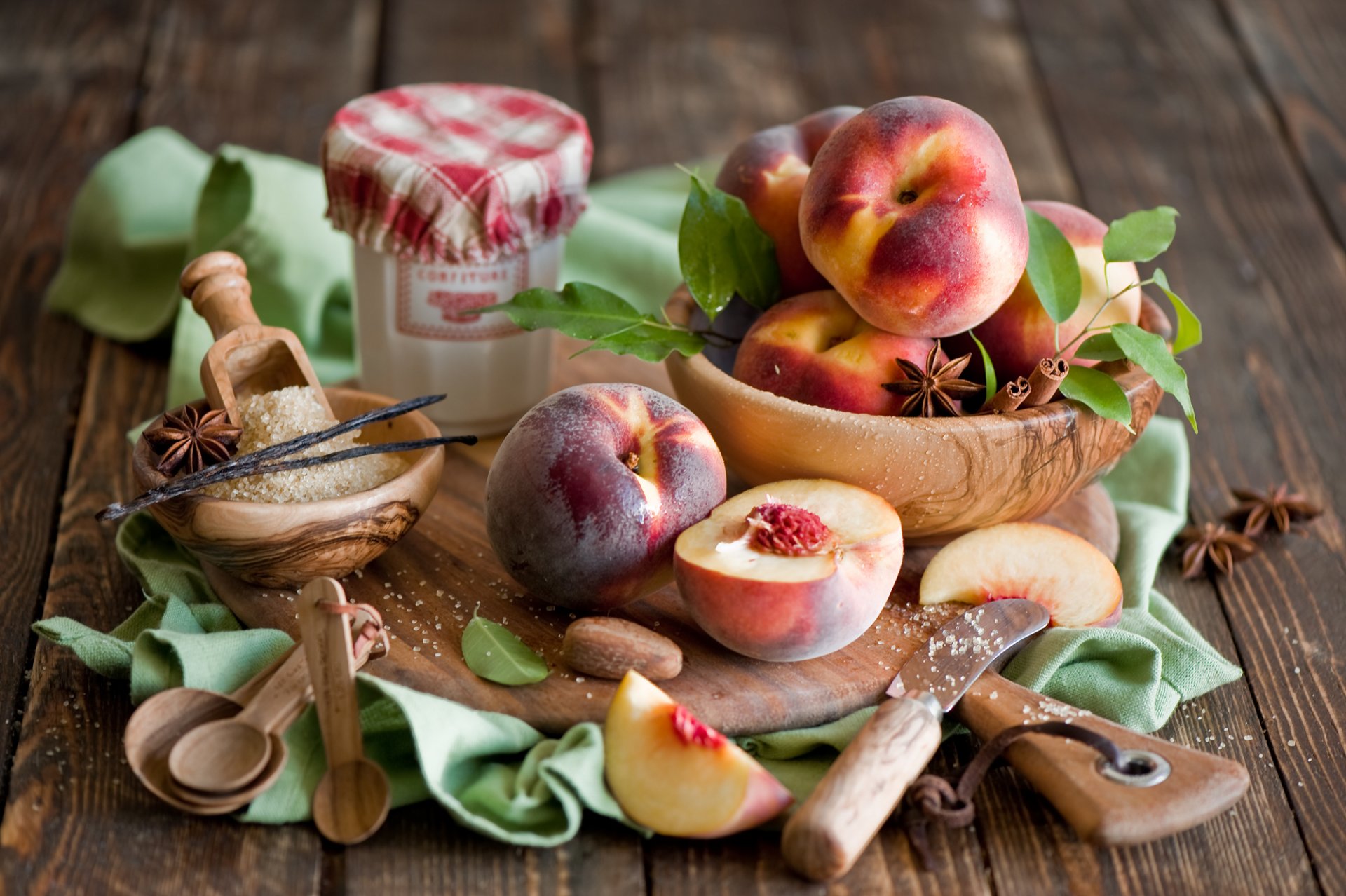 nectarine fruits peaches cinnamon anise star anise vanilla spices sugar board spoon tableware still life anna verdina