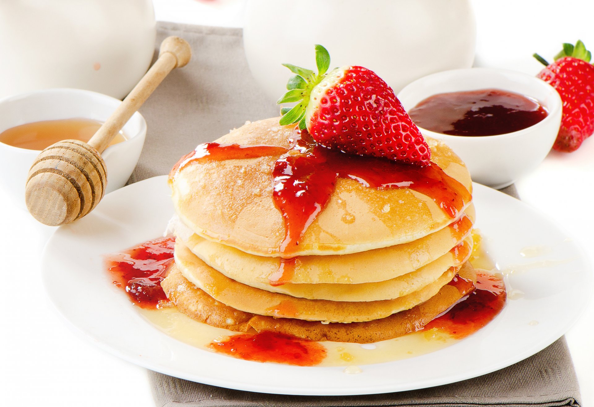 pancakes pancakes pancakes jam honey strawberries berries red food