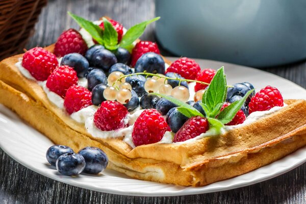 Baked on a platter with berries and mint