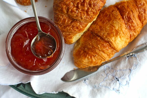 Croissants served with thick jam