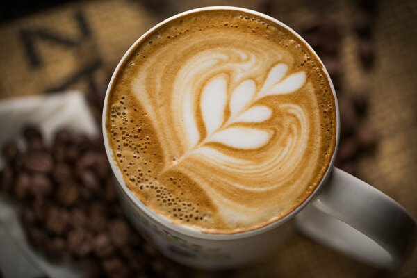 White cappuccino cup with a pattern