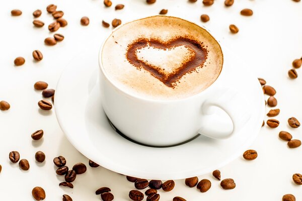 Beautiful cup of coffee with a heart pattern