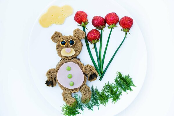 Children s breakfast with a cute bear cub