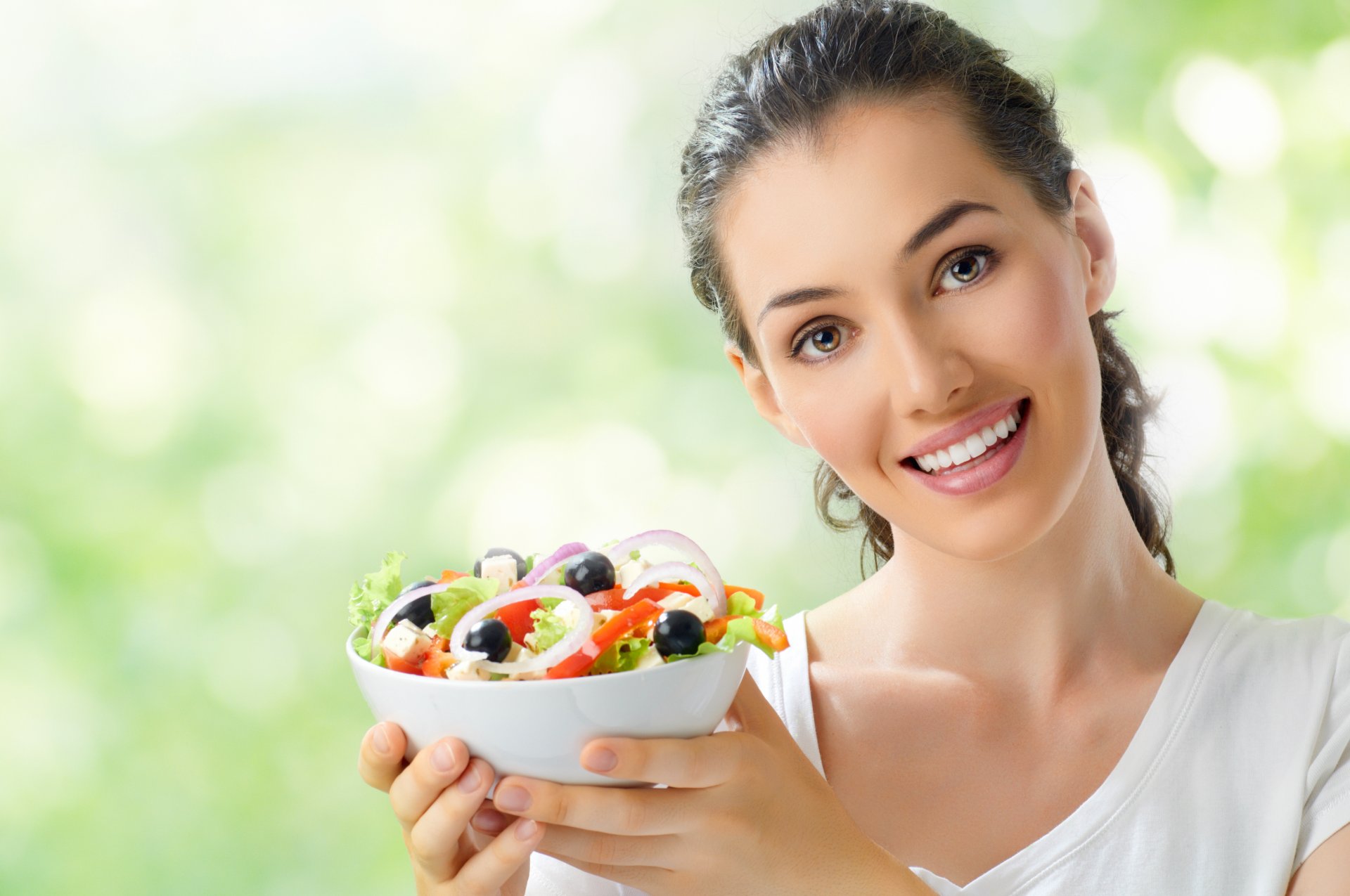 girl brown hair dish fork salad vegetables charm cucumber olives torment cheese tomatoes jersey smile bokeh brown-eyed view