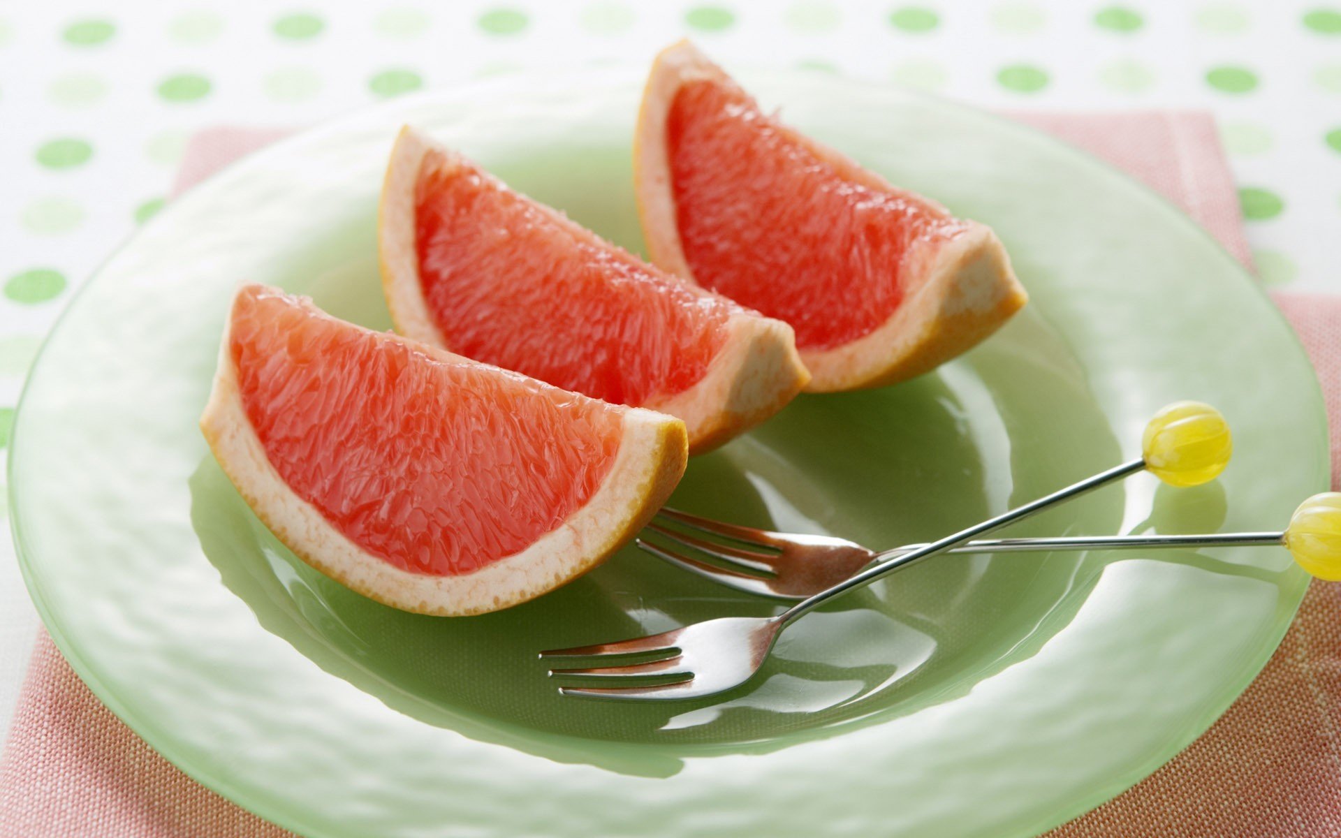 food fruit fruit grapefruit slices. forks. plate background wallpaper