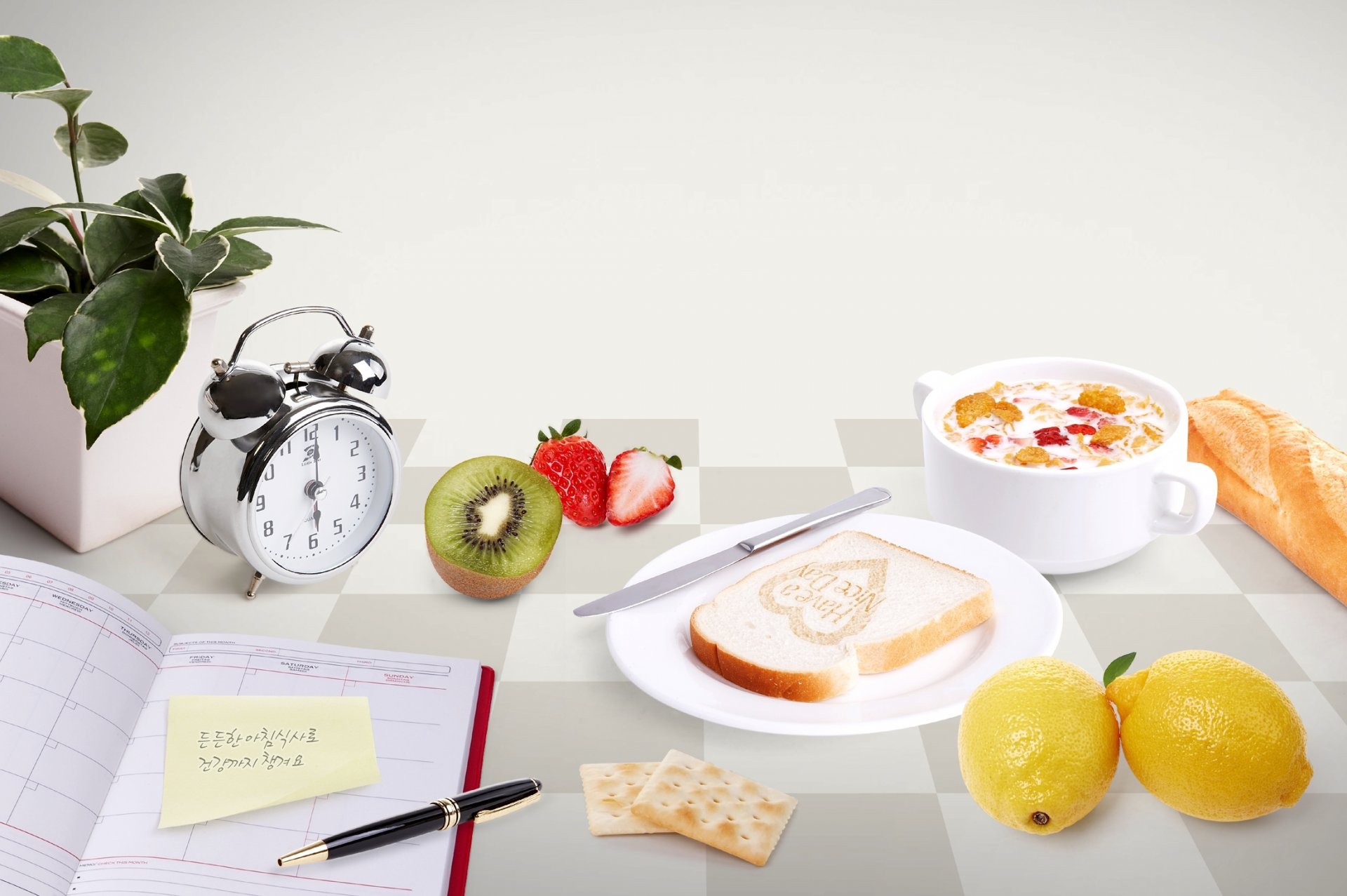 morning breakfast notebook pen crackers service flower kiwi strawberry dish knife toast lemons cup milk bread table