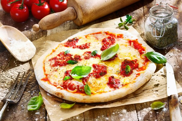 Fragrant and juicy pizza with cheese and tomatoes