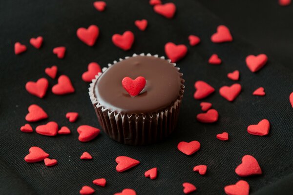 Sweet dessert with heart-shaped chocolate