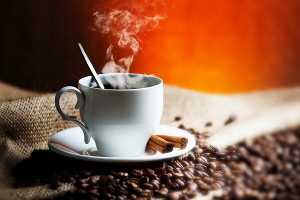 Fresh coffee in a white cup on a saucer