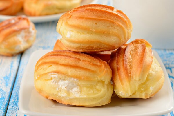 Custard eclair with sweet cream