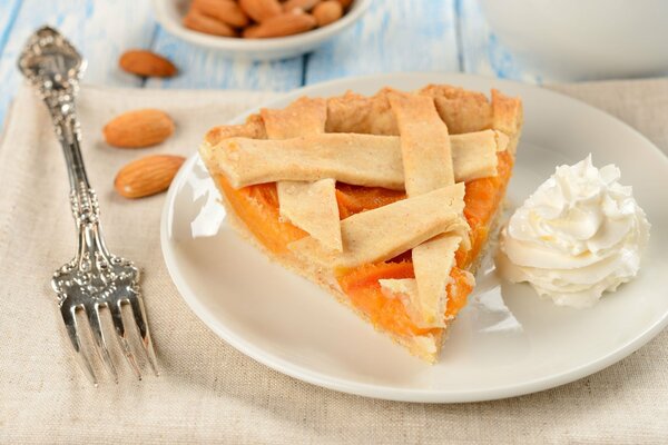 Apricot pie on a plate with a fork