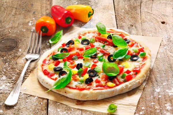 Pizza with olives and bell pepper