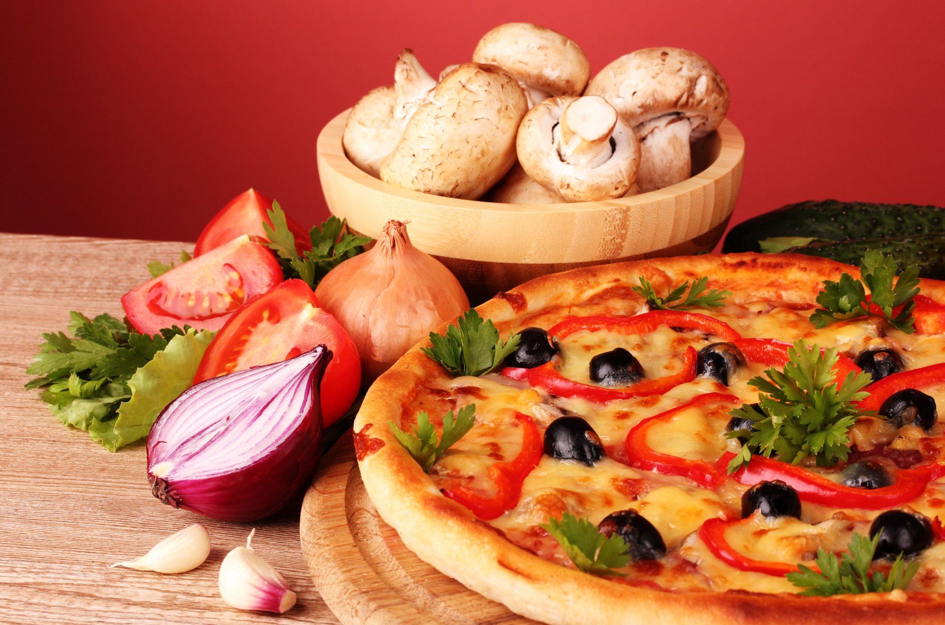 pizza mushrooms champignons garlic parsley olives paprika onion tomatoes still life