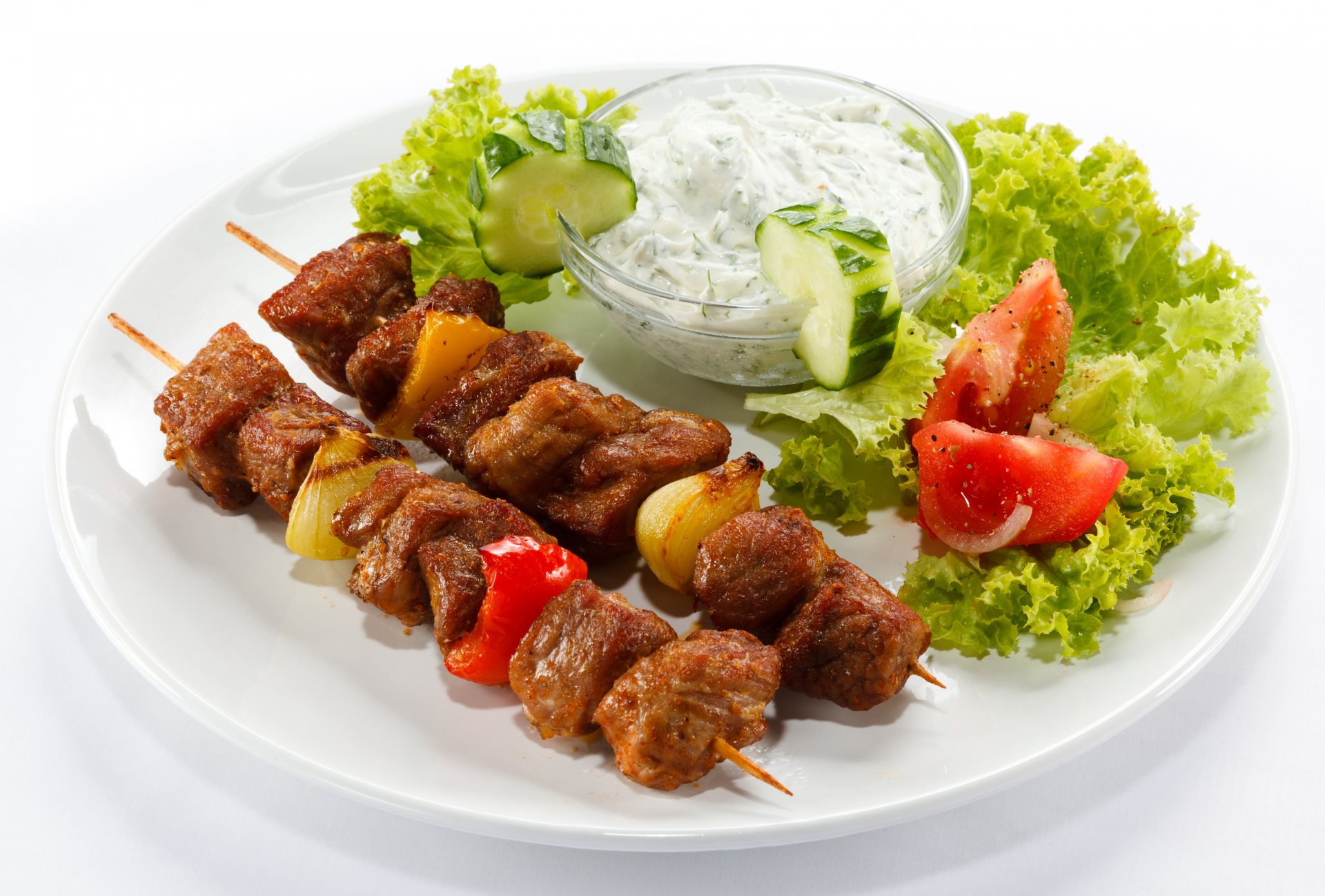 dish sauce cucumber tomatoes salad meat skewers pepper torment