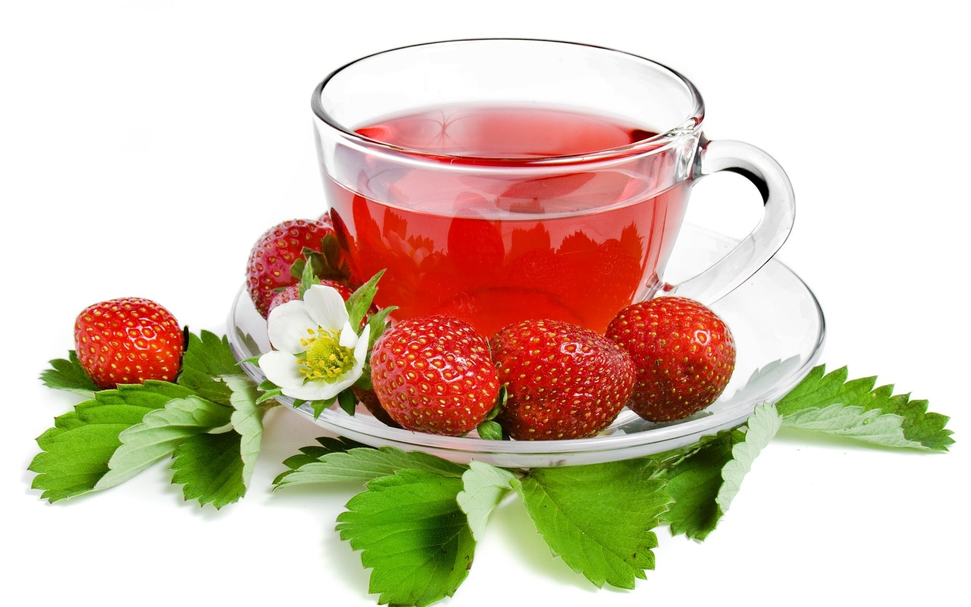 tea strawberry berry cup saucer leaves white background