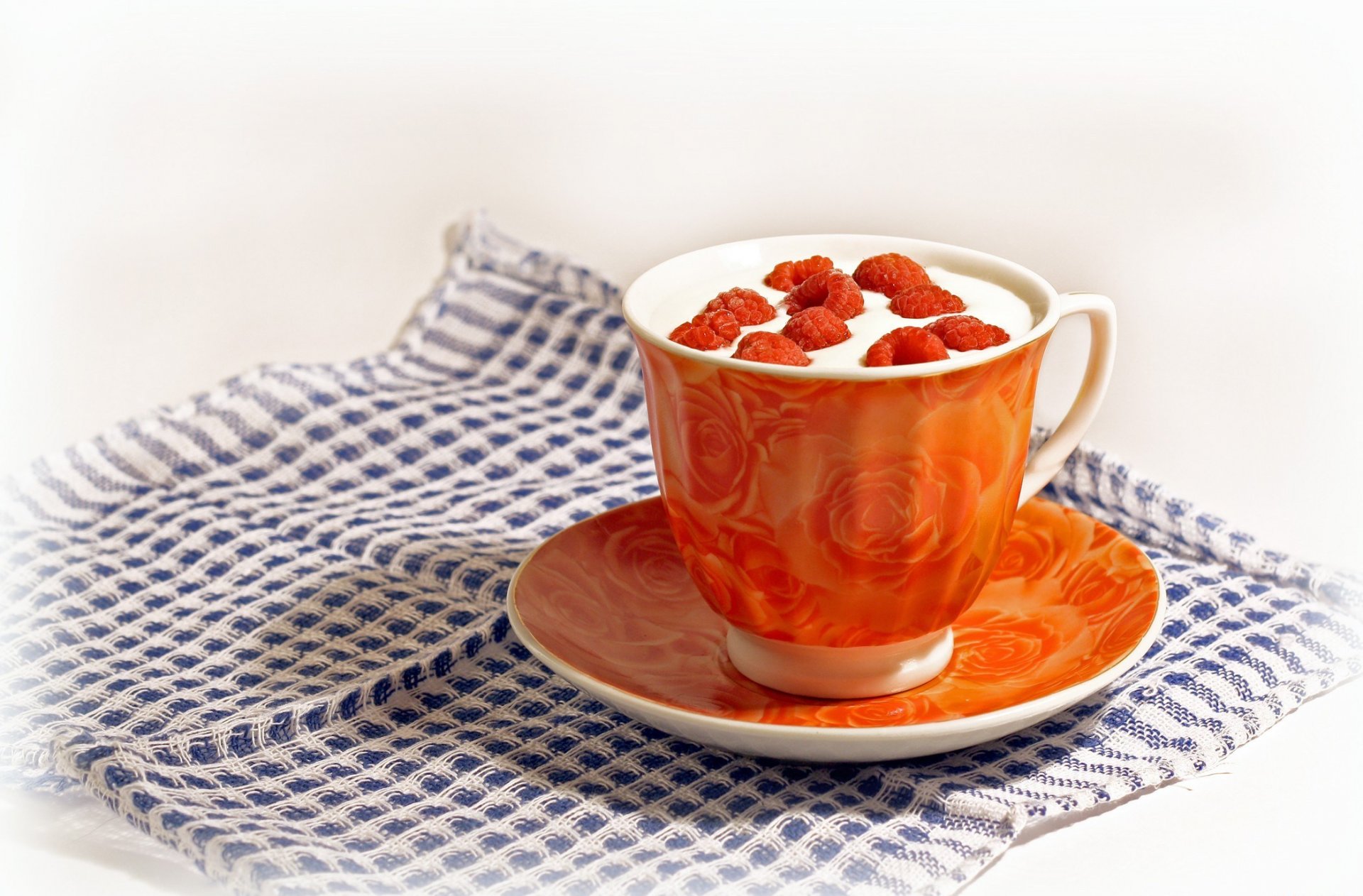 tea drink cup napkin berries raspberry orange