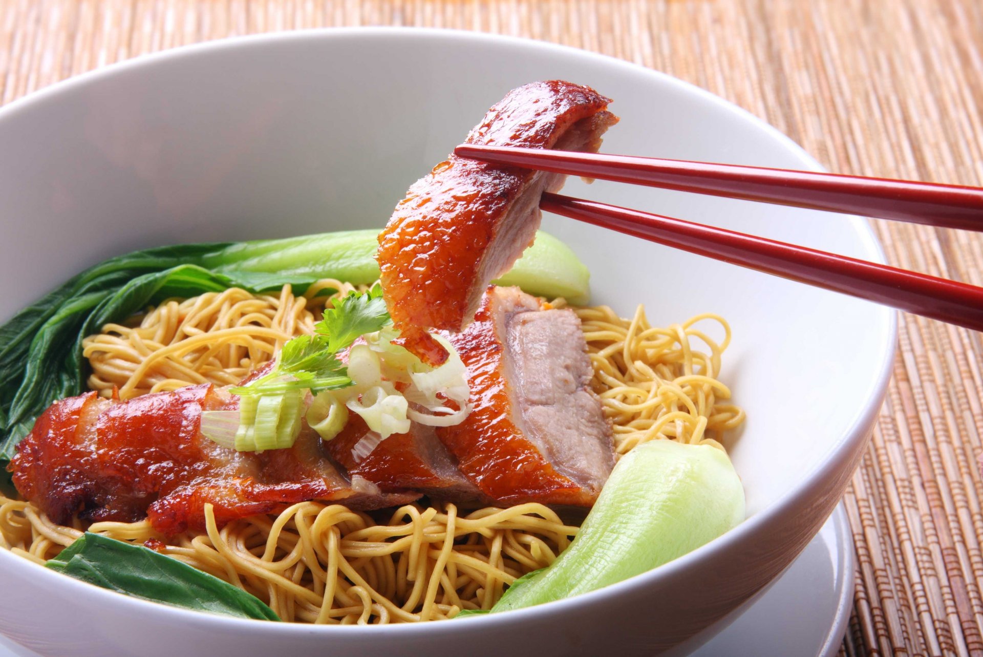 dish noodles meat sticks green