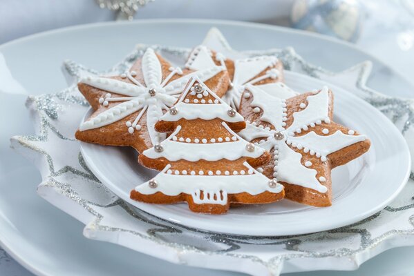 Christmas cookies in the form of Christmas trees and stars