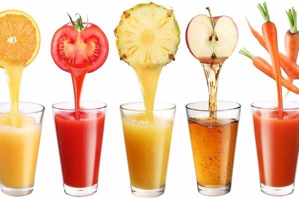 Squeezing fruit juice on a white background