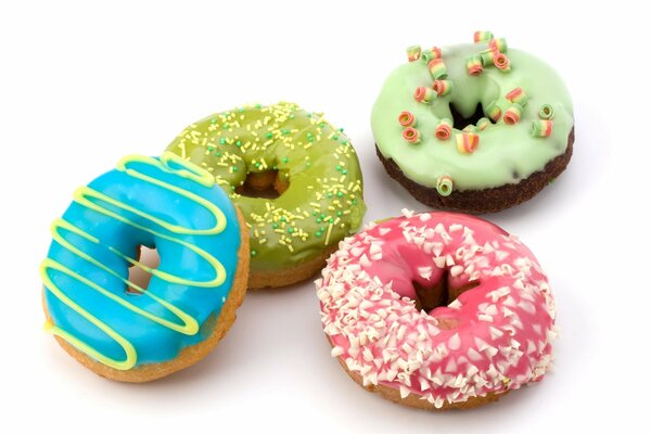 Delicious donuts in multicolored glaze