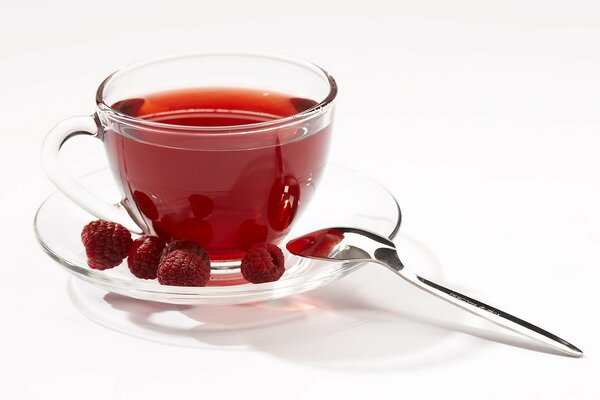 Raspberry tea in a glass cup