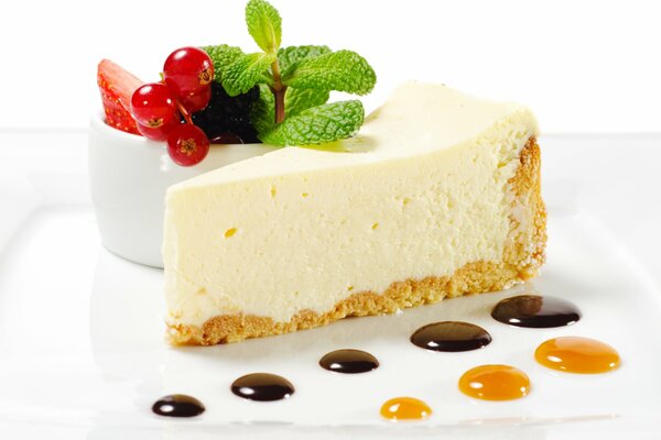 A piece of cheesecake cake on a white background