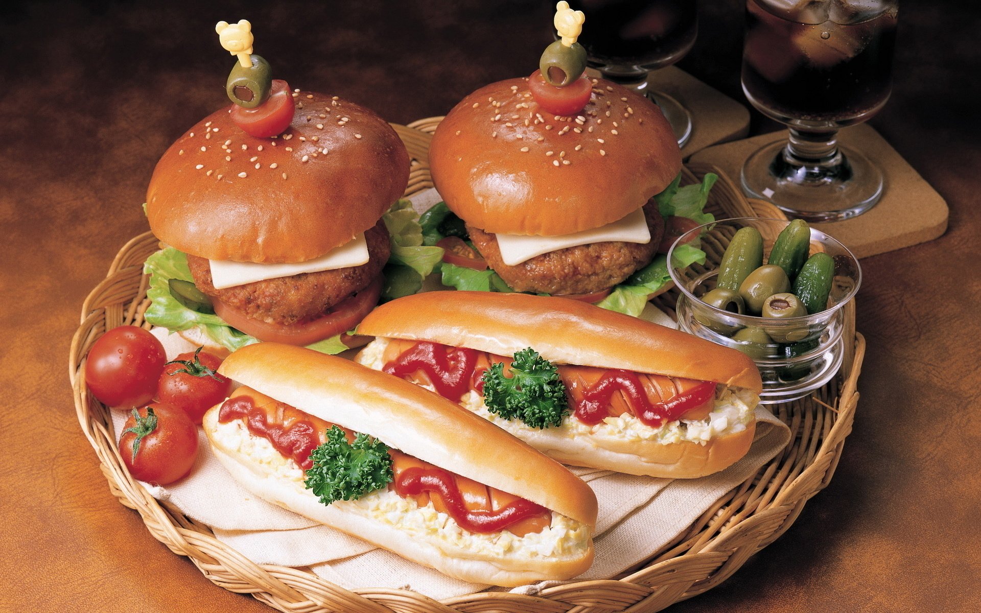 andwiches burgers tray glasses pickles gherkins ketchup sauce hot-dog sausage tomatoes cherry patties olives green cheese food