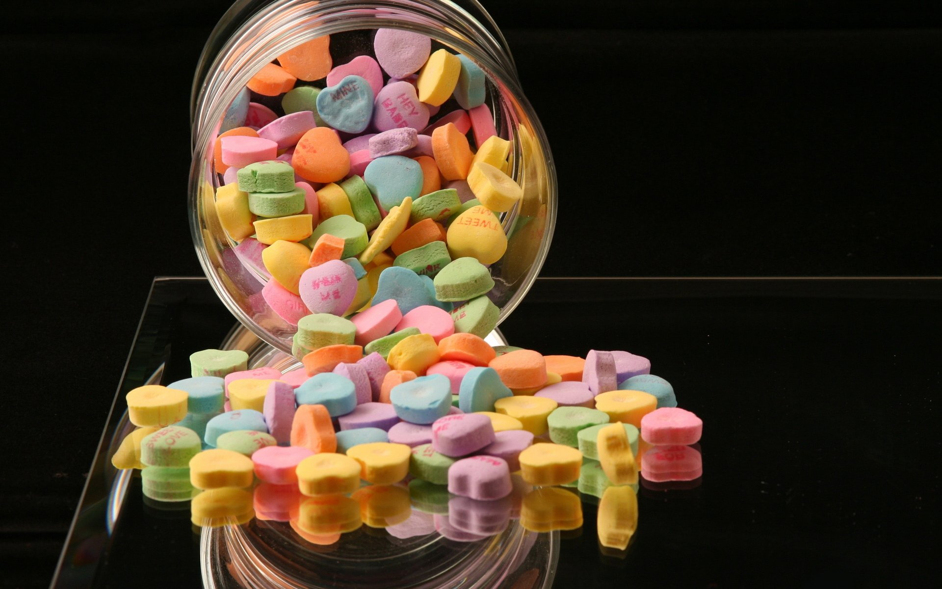 food sweet heart colored bright color jar of the bank bean black background
