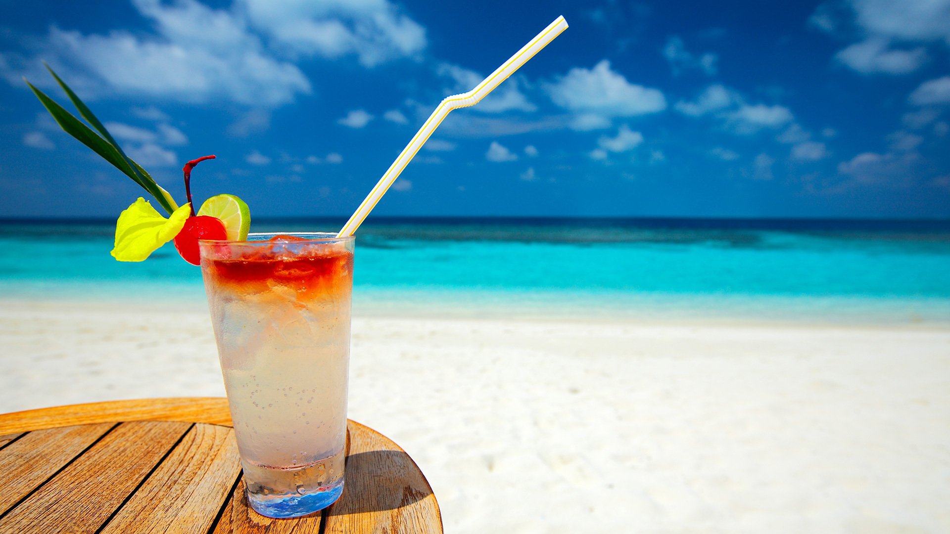 cocktail glass sea sand beach tube cooling table sky