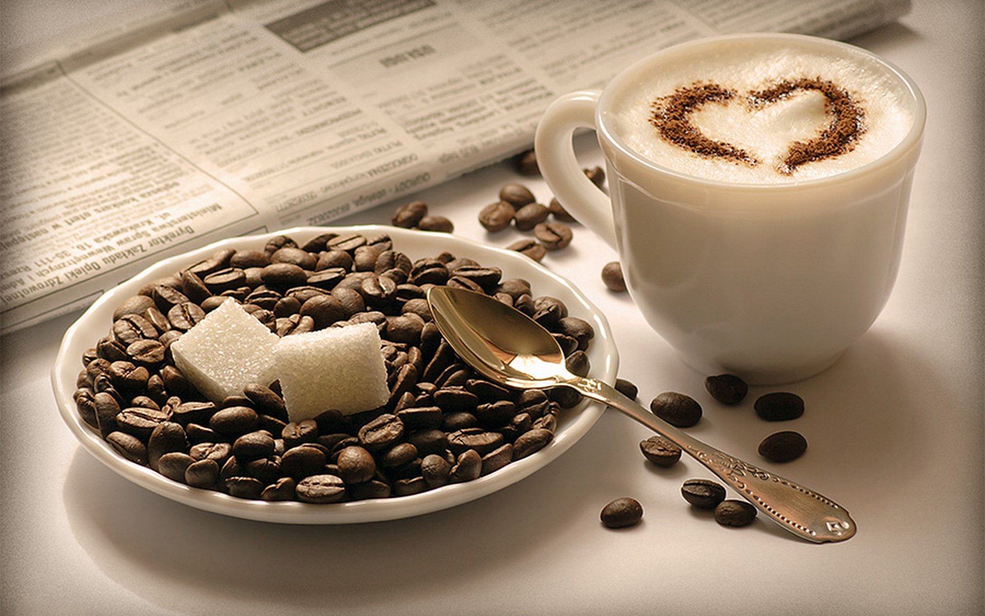 cappuccino cup saucer coffee grain sugar blocks spoon newspaper
