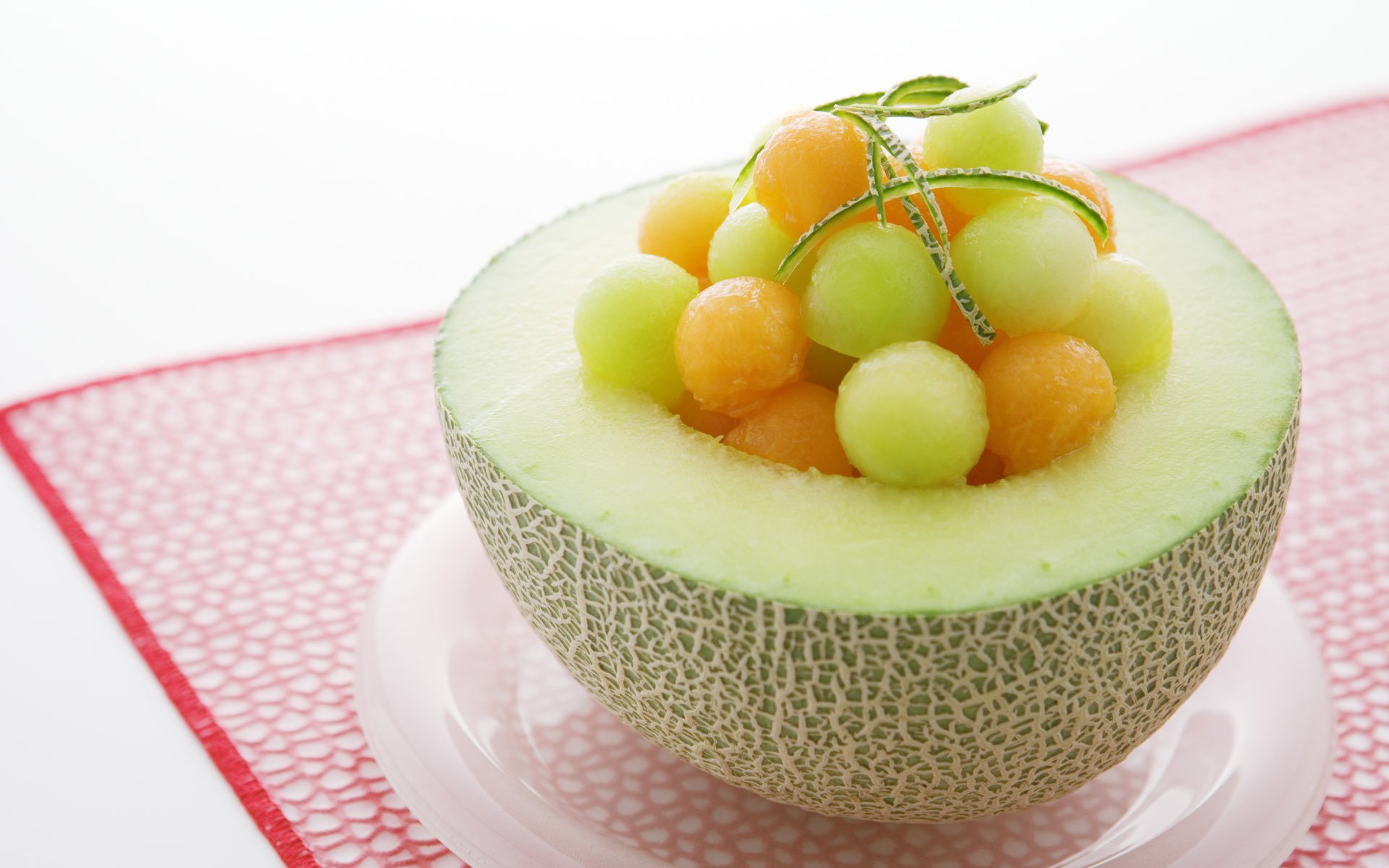 cibo frutta melone uva piatto sfondo