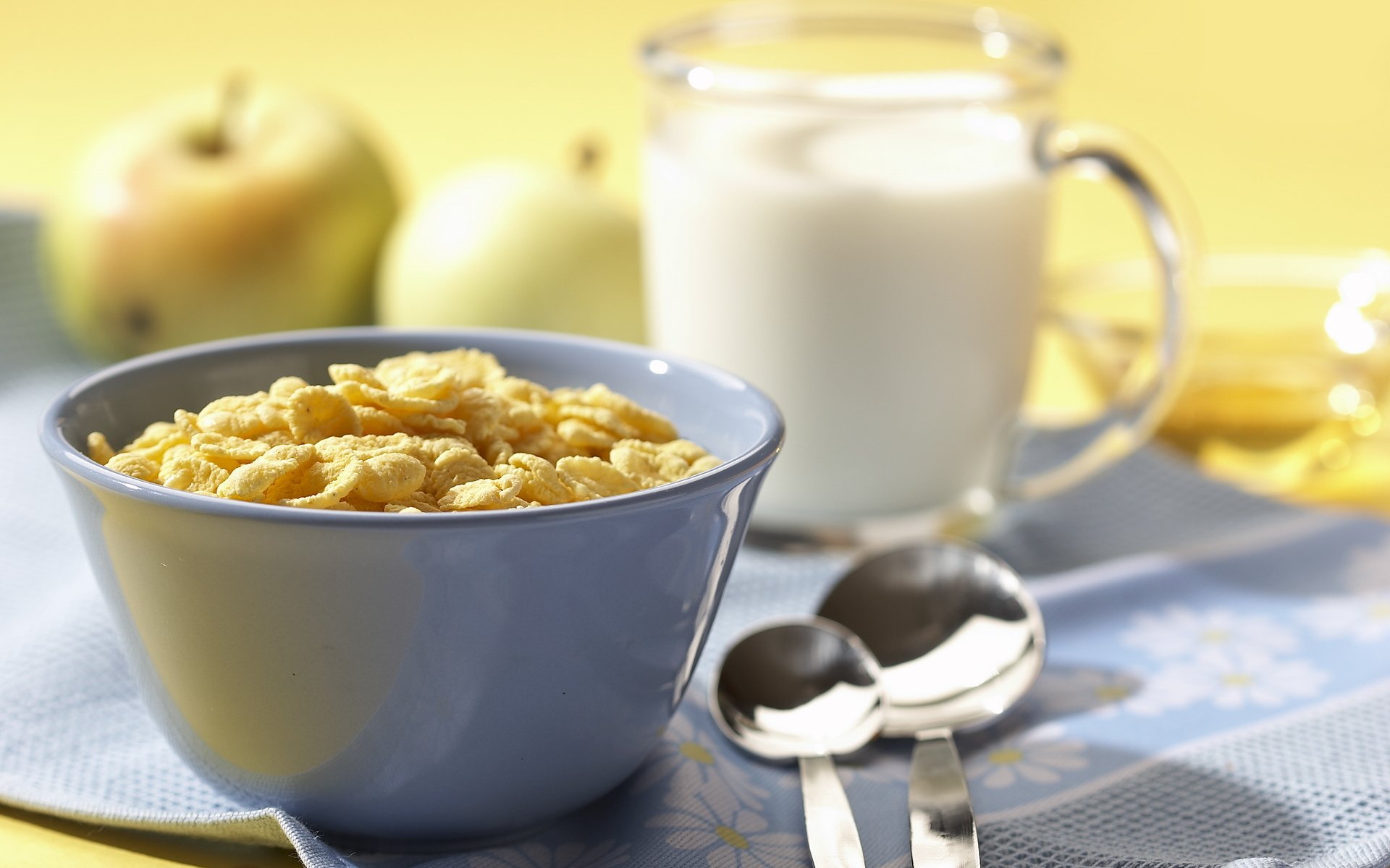 food sweet flakes light breakfast milk glass apple spoon