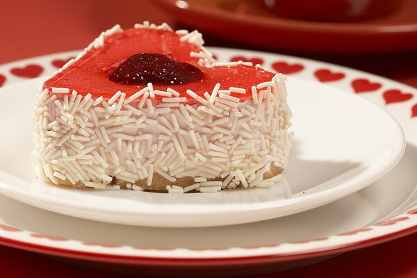 Heart-shaped cake with strawberry jam
