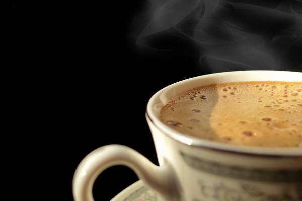 Hot aromatic coffee with foam
