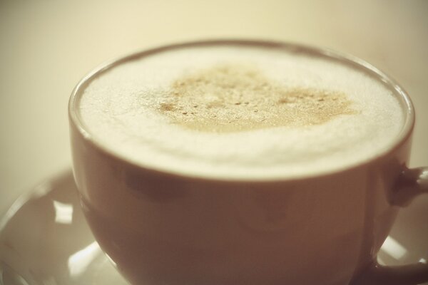 Warming cappuccino in a cozy cafe