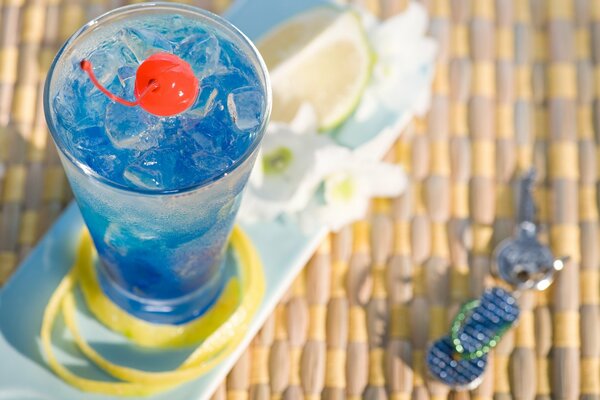 Beautiful photo of a cocktail with cherry and lemon