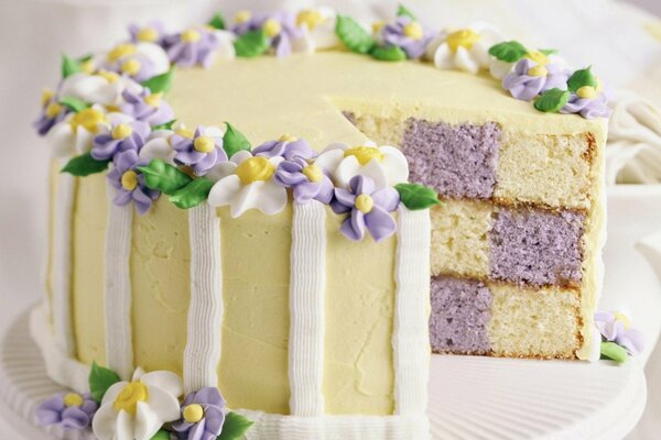 Cream cake with flowers for the holiday