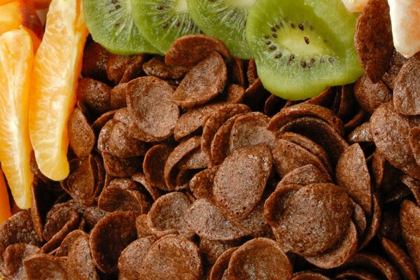 Corn flakes with orange slices and kiwi