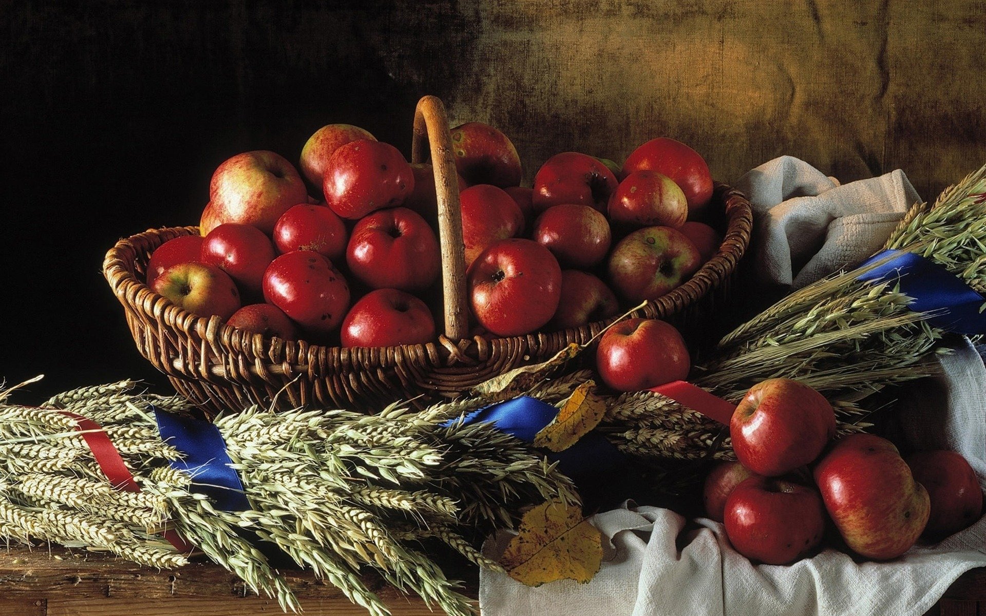 naturaleza muerta rojos manzanas mimbre cesta