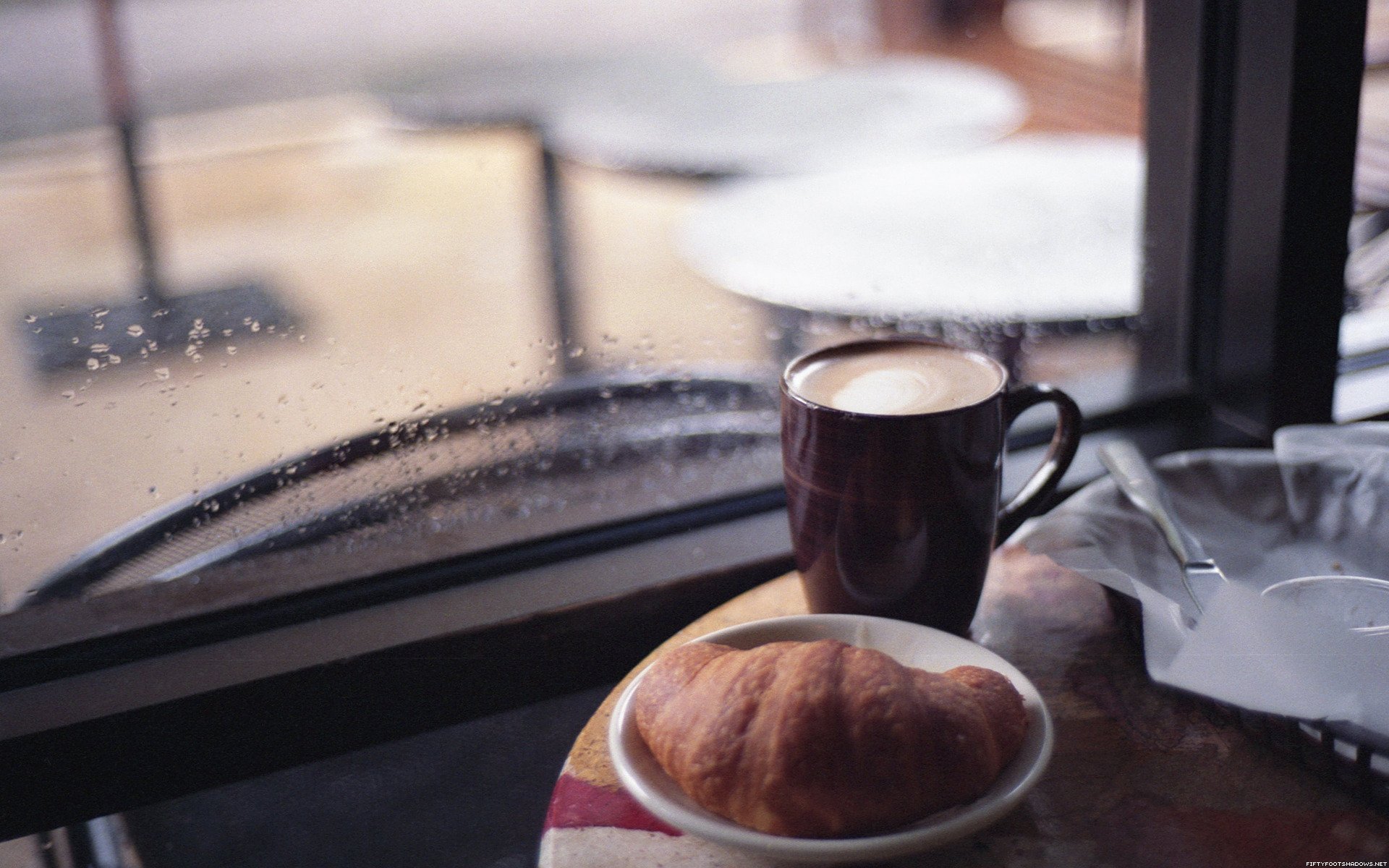 croissant cappuccino coffee rain