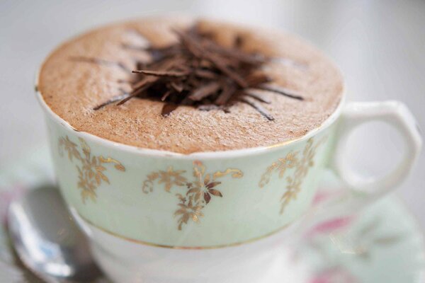 Coffee cup with gilt pattern